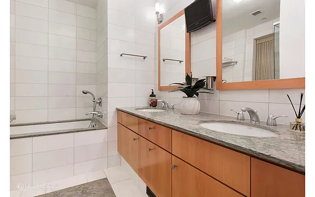 Sold by Douglas Elliman | media 18