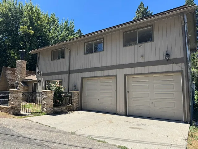 FRONT WITH TWO GARAGES
