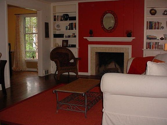 Comfortable living room with fireplace and wooden floors