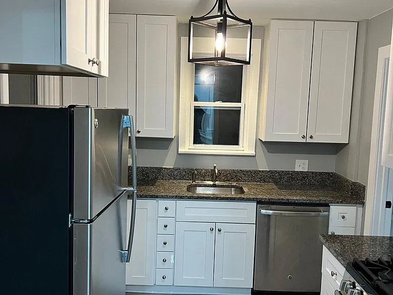 1627 E Asbury Ave — Photo 2
