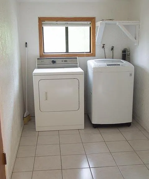 Laundry room - washer (brand new) & dryer