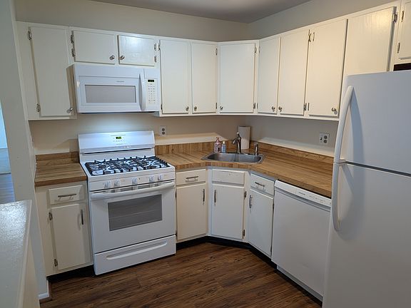Cozy kitchen, with space for a table for two.