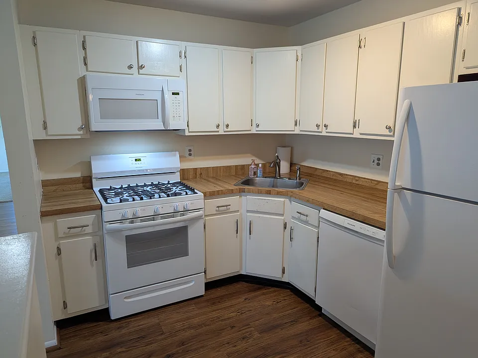 Cozy kitchen, with space for a table for two.