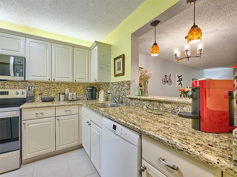 10143 Mangrove Dr #303 — Photo 21