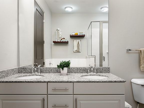 Experience luxury in every detail with this elegant bathroom design.