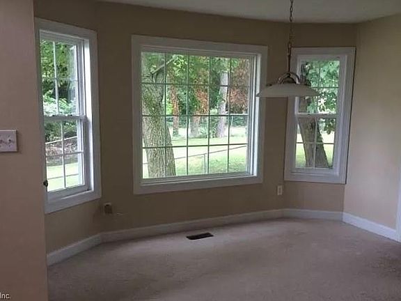 Dining room area with bay window