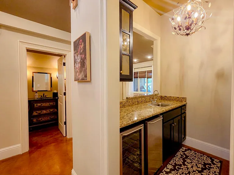 Wet bar with beverage center and sink