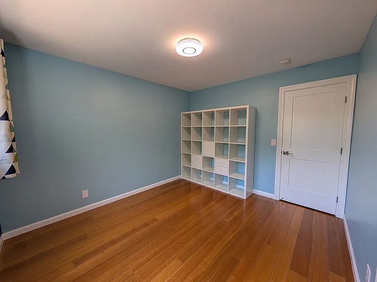 Middle bedroom, facing the door.