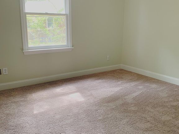 Bedroom 2! New flooring and new paint throughout the home! Ceiling fans in all bedrooms.
