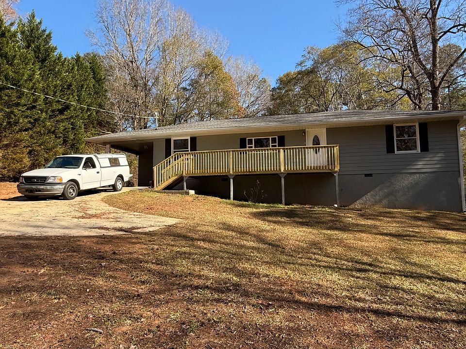 Front of the house with a porch.