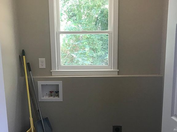 Laundry room with hook ups available