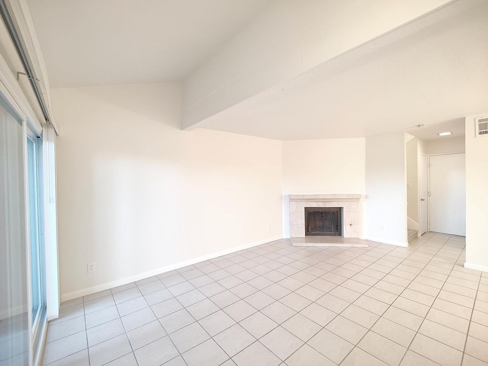Spacious Living Room with Fireplace
