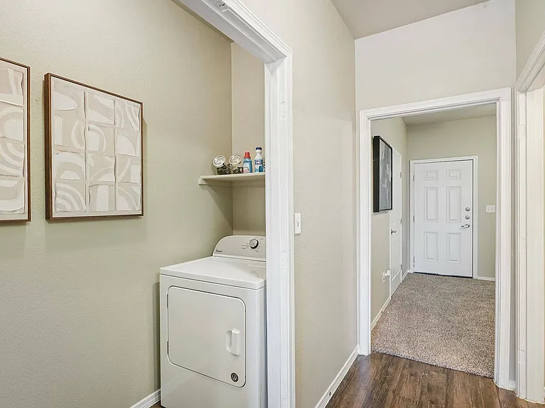 Enjoy in-unit laundry with washer and dryer connections at Arroyo Seco Villas in San Antonio.