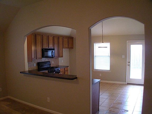 Kitchen has area for breakfast room