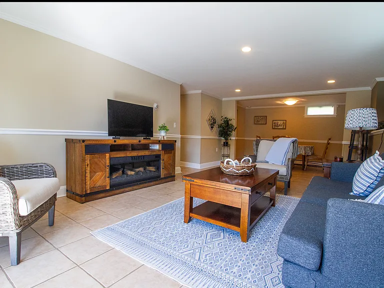 Beautiful furniture makes this a cozy, relaxing, space.
