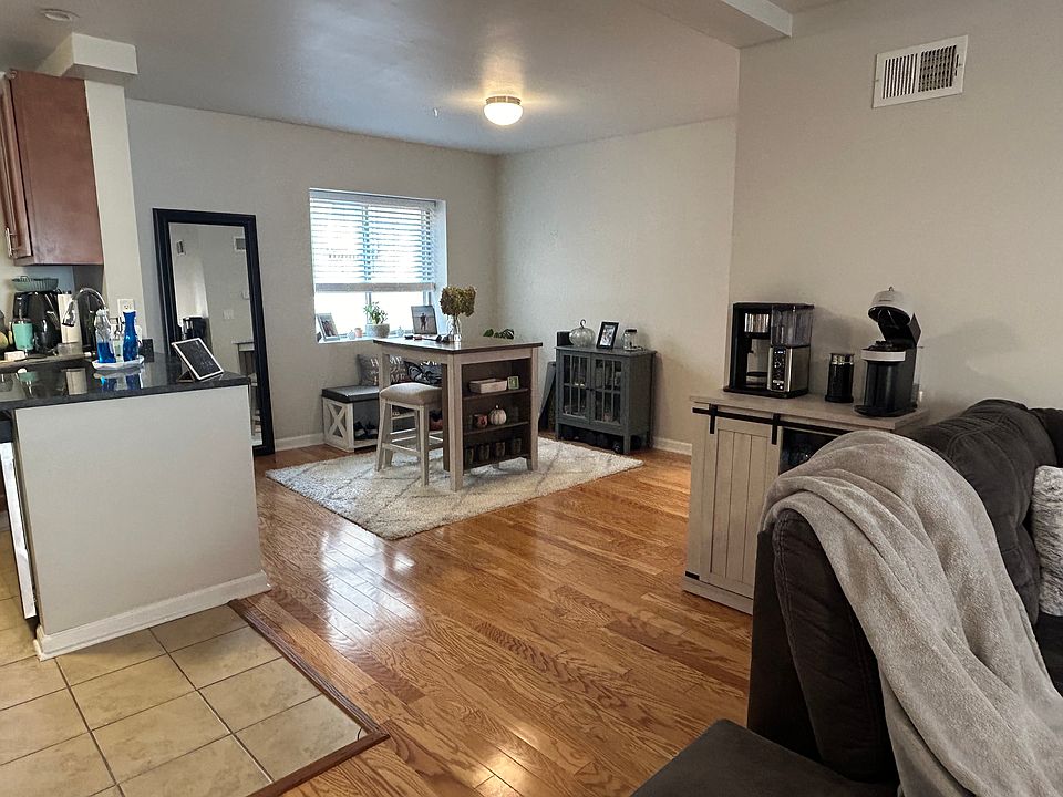 Spacious & Open w/ gorgeous hardwood floors throughout and ample natural lighting through large windows.