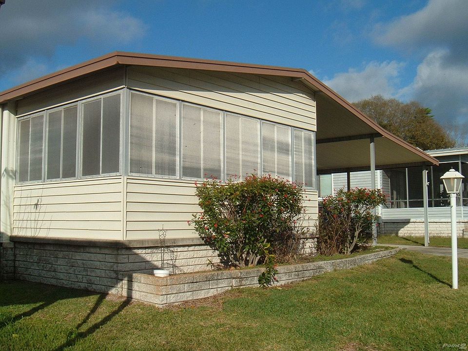 Front showing enclosed porch