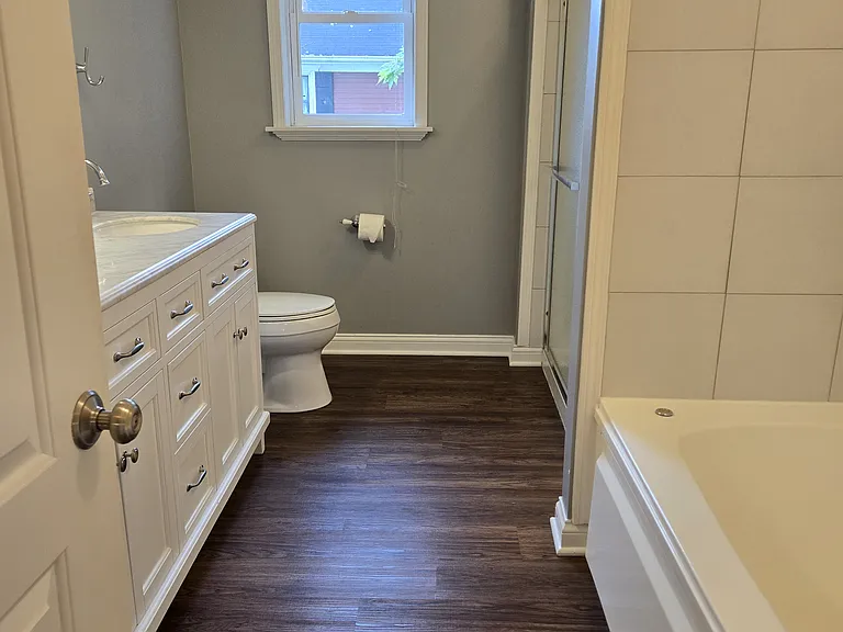 Upstairs Bathroom with Double Sink, Jacuzzi Tub and Walk in Shower