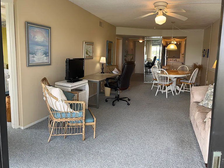 Looking toward entry hall on the left and kitchen on the right