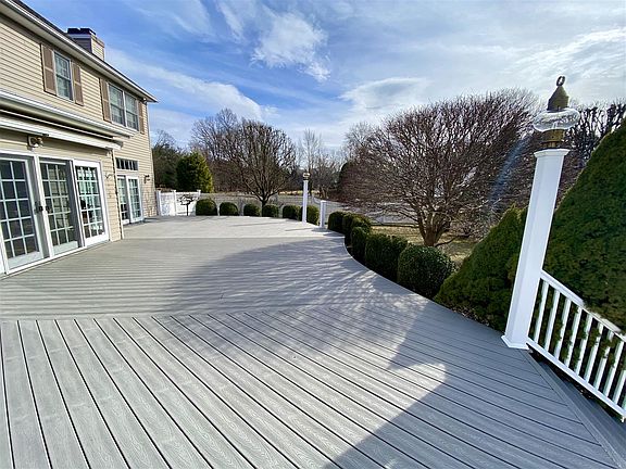 New composite deck, off kitchen, leading to pool