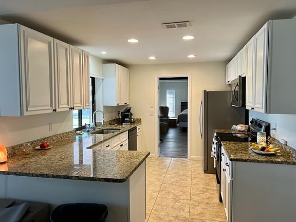 Kitchen with SS Appliances