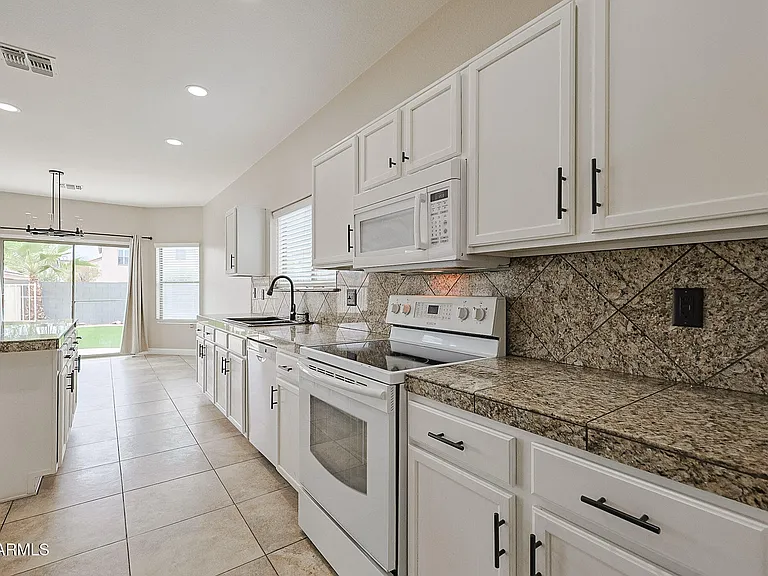 15569 W Gelding Dr — Photo 14