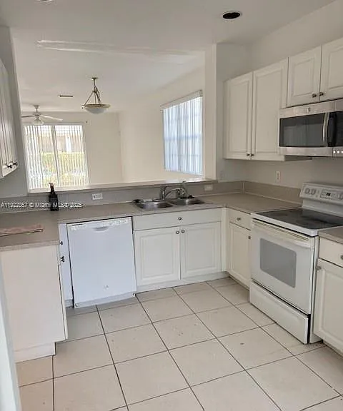 677 NW 42nd Ave — Photo 2