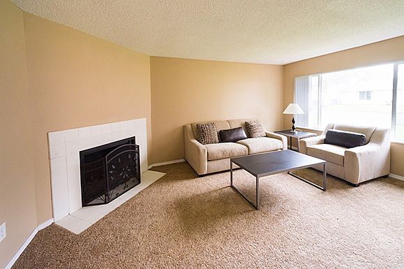 Spacious living room with fireplace