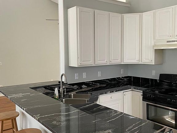 Kitchen looking into living space