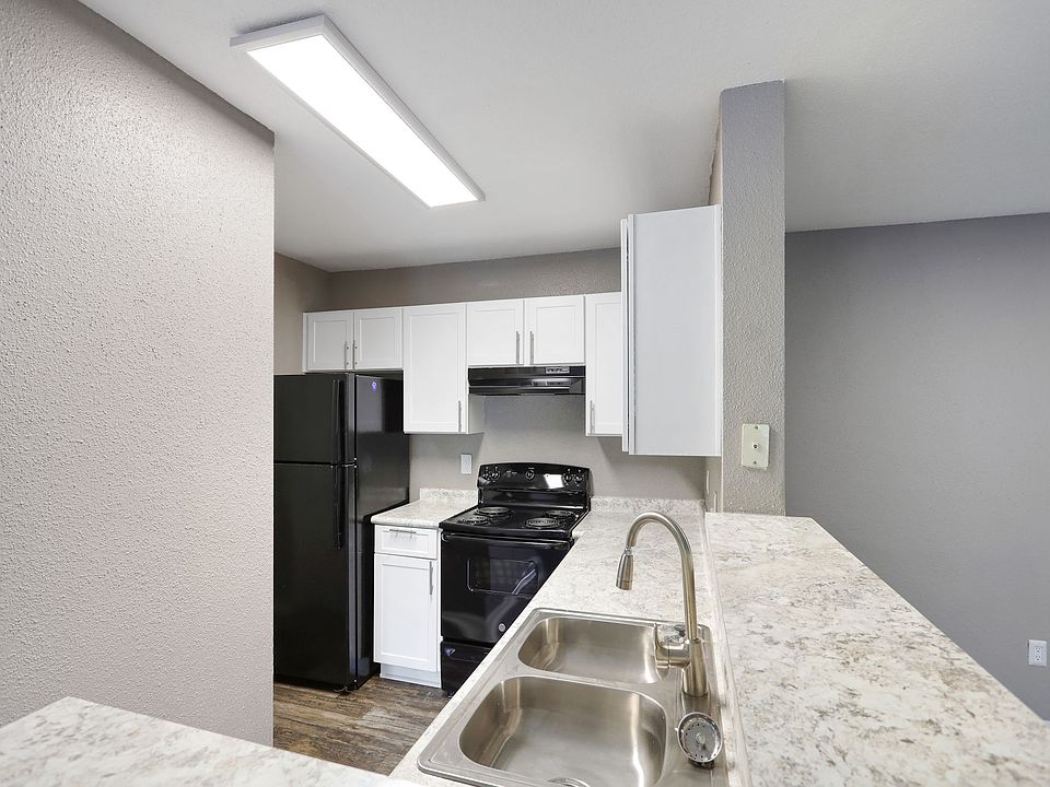 Model kitchen with custom counters.