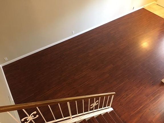 View from above. Beautiful wood laminate flooring throughout.