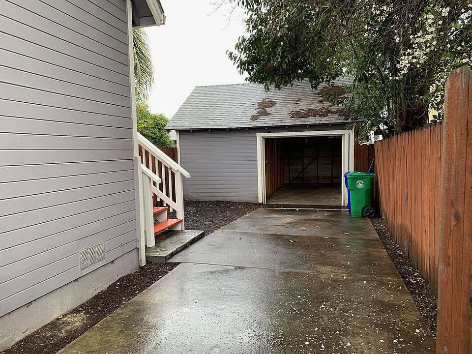Gated driveway with garage.