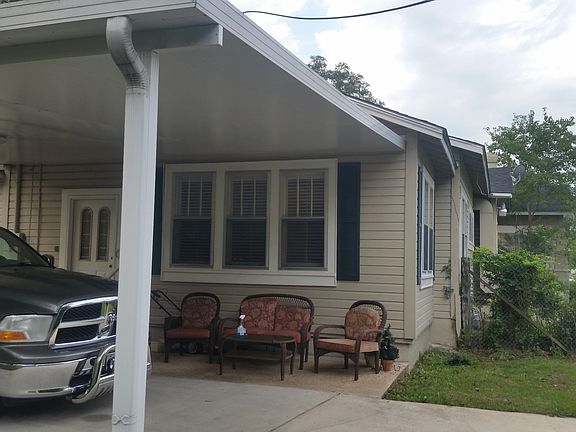 Rear showing carport