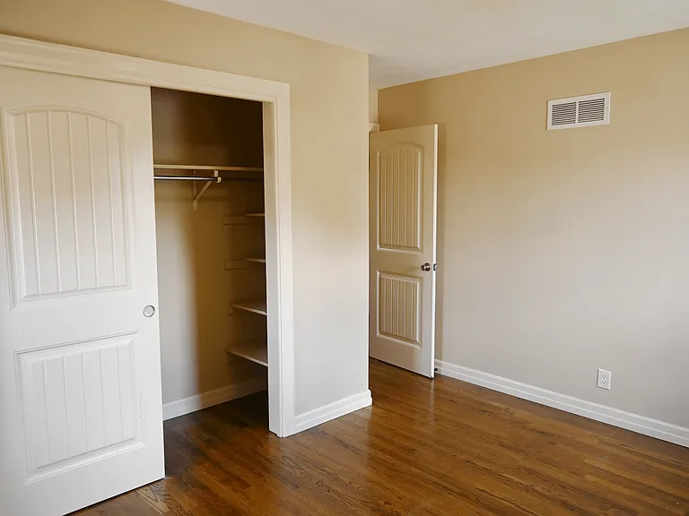 Bedroom and closet at Square 131 5-Plex.