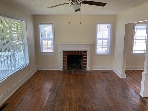 Front Family Room to Fireplace / Left Side of House