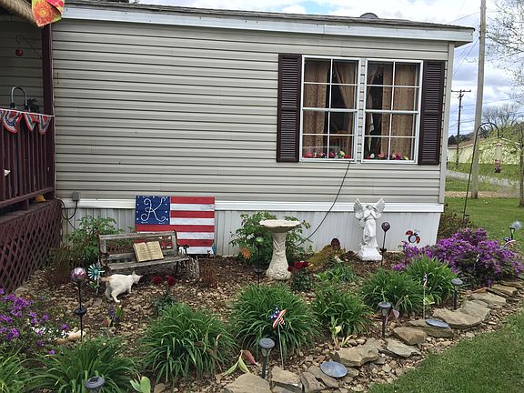 flower bed in front of porch
