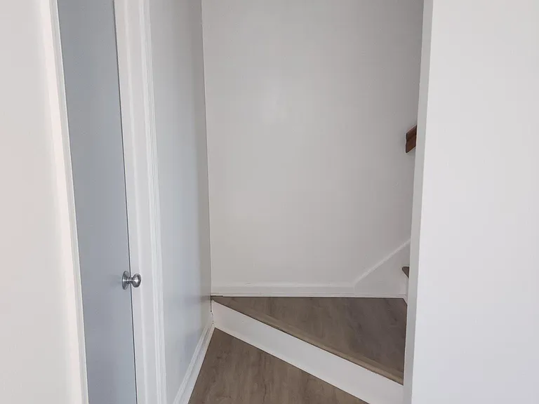 Stairs from 2nd floor toward the 3rd floor with bedrooms