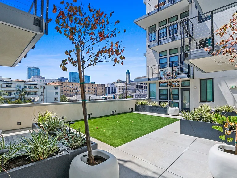 Zen Courtyard with Benches and Skyward Views
