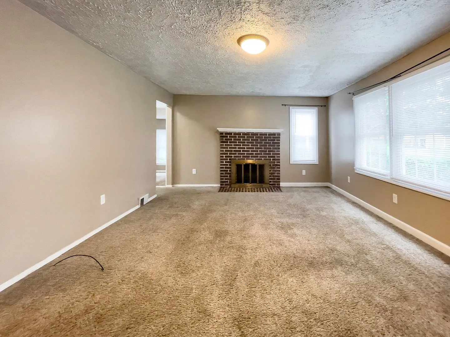 Walk to Ball State! Bright 4BR Home with Fireplace — Photo 4