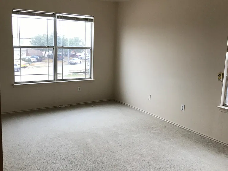 master bed room with front cul-de-sac window view
This room