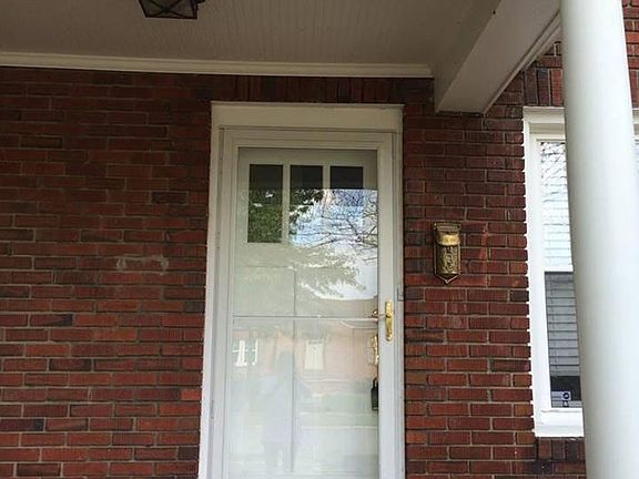 Front door. Vintage mailbox.