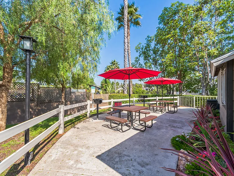 A BBQ and Picnic area at Meadow Creek Apartments in San Marcos, CA