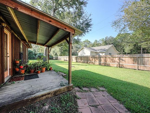 A view of the back porch out to the huge back and side yard.