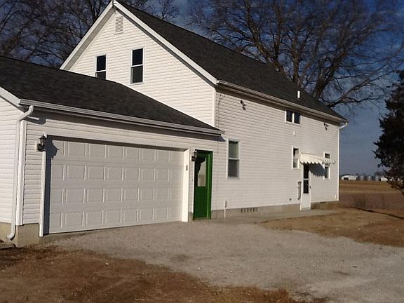 South side of house - 2 car attached garage with opener