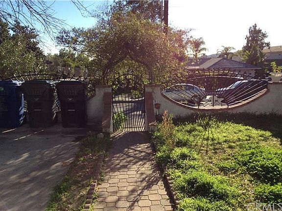 VIEW OF CUSTOM BUILT ROD IRON FENCE