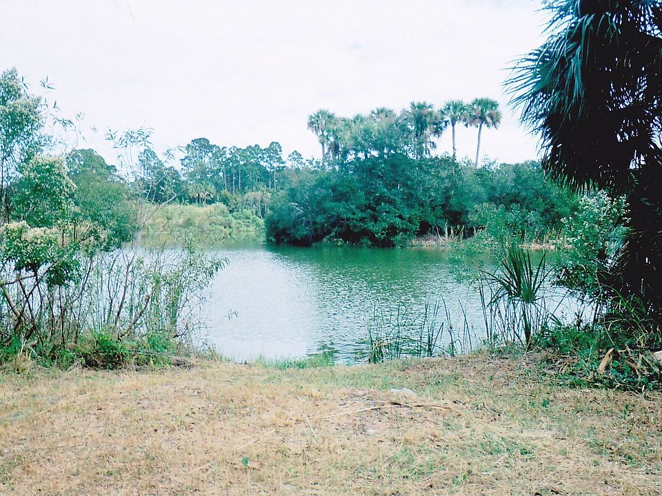 10 acres w/pond