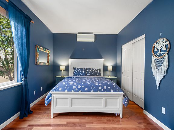 Cozy upstairs bedroom with queen bed