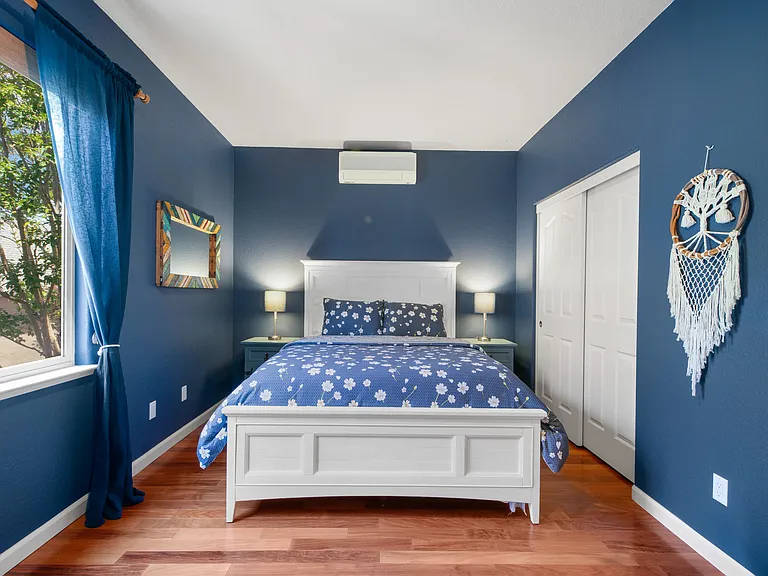 Cozy upstairs bedroom with queen bed