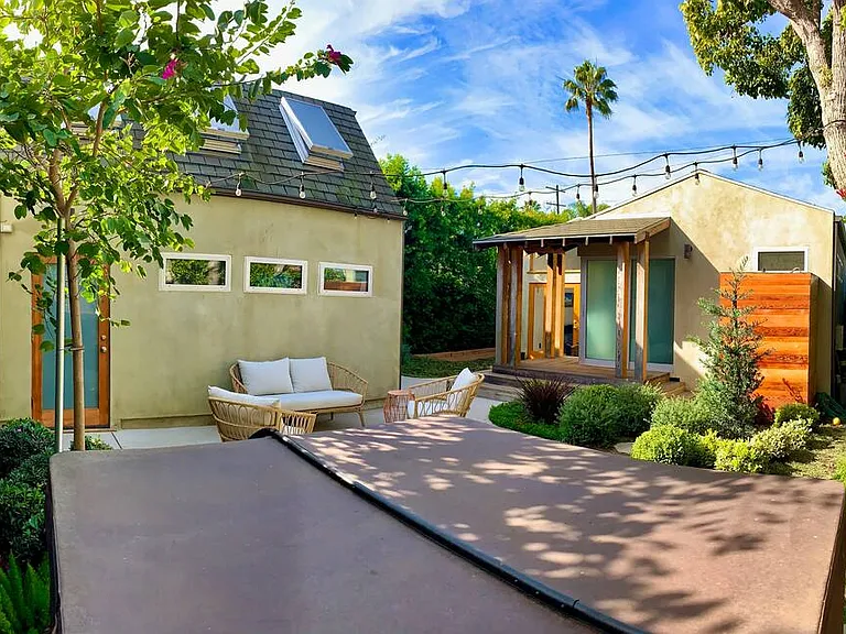 View of the backyard from behind the hot tub