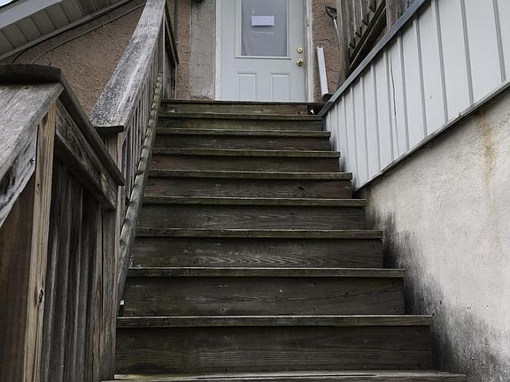 Stairs have been updated, one flight to entrance and outside porch.